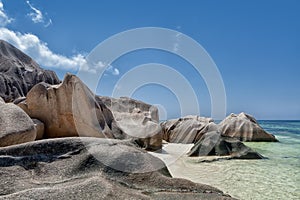 Anse Source d`Argent - granite rocks at beautiful beach on tropical island La Digue in Seychelles