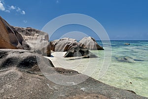 Anse Source d`Argent - granite rocks at beautiful beach on tropical island La Digue in Seychelles