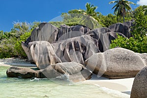 Anse Source d`Argent - granite rocks at beautiful beach on tropical island La Digue in Seychelles