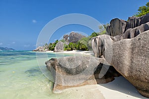 Anse Source d`Argent - granite rocks at beautiful beach on tropical island La Digue in Seychelles