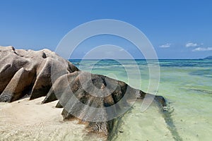 Anse Source d`Argent - granite rocks at beautiful beach on tropical island La Digue in Seychelles