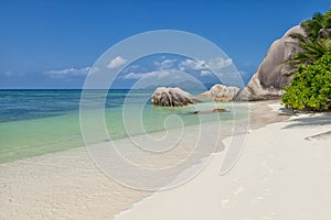 Anse Source d`Argent - granite rocks at beautiful beach on tropical island La Digue in Seychelles