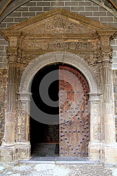 Anso Romanesque door arch in church Pyrenees photo