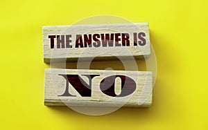 The answer is No on Wooden Blocks on yellow. Business or relationship concept