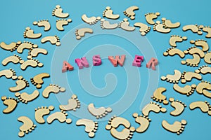 Answer Search Concepts. Concepts search answer. footprints and the word answer on a blue background