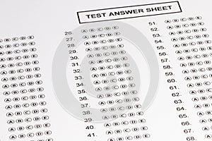 Answer sheet form with pencil on table, close up. Concept of passing exam