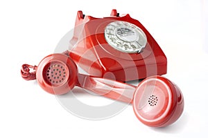 Answering an old fashioned red telephone