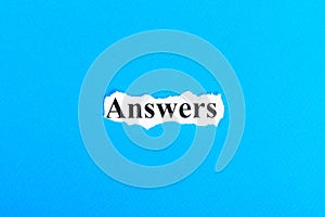 answers text on paper. Word answers on torn paper. Concept Image