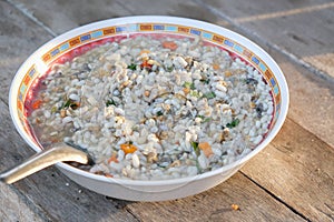 Ant egg fried in plate on wood
