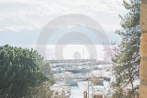 Antalya\'s sun-drenched old city marina and mountains