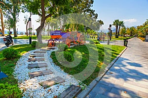 ANTALYA, TURKEY: Carriage in the park on the beach territory of Konyaalti beach in sunny summer in Antalya.