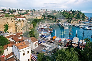 Top view of Antalya city and harbour with moored ships