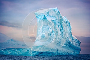 Antarctic iceberg floating in ocean