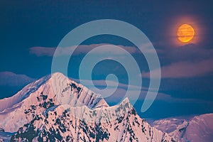 The Antarctic mountains. Polar sky background.