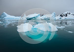 Antarctic nature landscape with icebergs in Greenland icefjord during midnight sun. Antarctica, Ilulissat, West