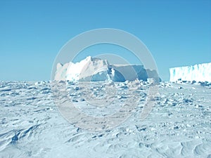 antarctica ice icebergs sea snow winter day