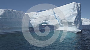 Antarctica iceberg aerial drone flight.