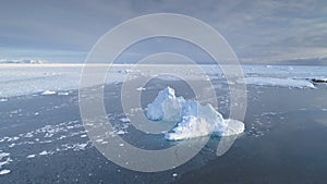 Antarctica iceberg in brash ice aerial view