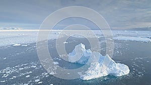 Antarctica iceberg in brash ice aerial view