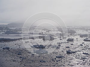 Antarctica iceberg landscape in fog