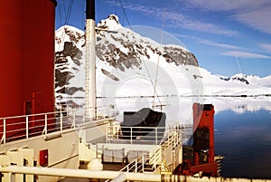 antartic icebergs floating on the sea from aerial point ofrf view in panoramic view snow covered photo