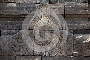 Antefixes that decorate the balustrades and stupas on the upper levels of the Borobudur temple