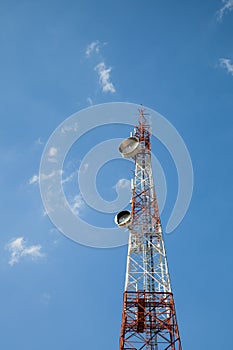 Antena tower on blue sky photo