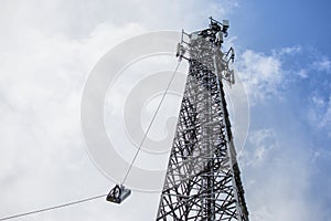 antenna 5g mobile network transmitter was pulled to the top of a mobile phone pole. to upgrade from 4g to 5g High-risk electrical