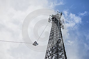 antenna 5g mobile network transmitter was pulled to the top of a mobile phone pole. to upgrade from 4g to 5g High-risk electrical
