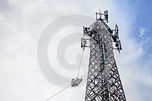 antenna 5g mobile network transmitter was pulled to the top of a mobile phone pole. to upgrade from 4g to 5g High-risk electrical