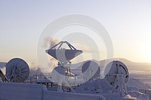 Antenna against winter landscape in Chukotka