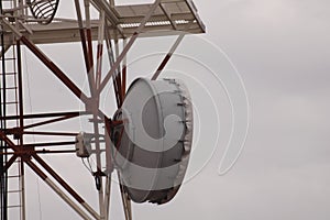 Antenna and a ladder on the top of the communications tower