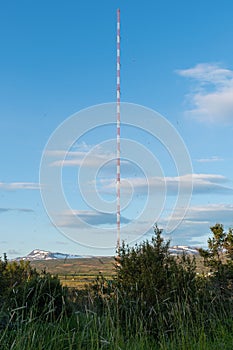 Antenna mast in vilalge of Eidar in Iceland