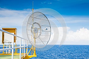 Antenna at offshore oil and gas wellhead remote platform for communication.