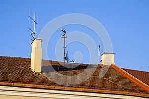 Antenna on the roof of the house.
