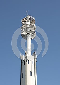 Antenna tower against a blue sky