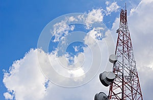 Antenna tower for telecommunication or radio, or microwave on cloud and blue sky background