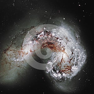 Antennae Galaxies NGC 4038, NGC 4039. Elements of this image furnished by NASA. Retouched image
