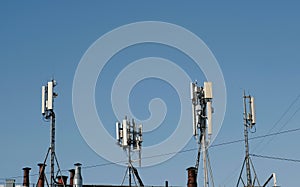 Antennas for cellular and mobile communication in sky background. Antennas of mobile phone communication, television