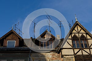 Antennas on the roof of an old house