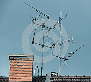 Antennas of the world. Blue sky and antenna.