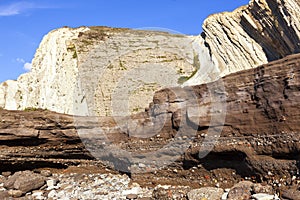 Anthropocene. Industrial sediments layer in cemented beach