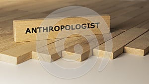 Anthropologist written on wooden surface. Concept created from wooden sticks