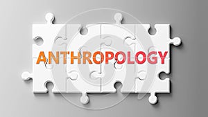 Anthropology complex like a puzzle - pictured as word Anthropology on a puzzle pieces to show that Anthropology can be difficult photo
