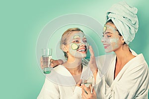 Anti age mask. Stay beautiful. Skin care for all ages. Women having fun cucumber skin mask. Relax concept. Beauty begins