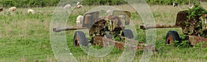 Anti-aircraft warfare or counter-air defense, abandoned. Wrecks of old vehicles belonging to the Albanian army in the air field photo