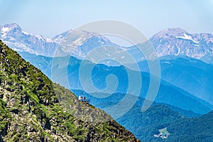 Anti-Avalanche Station and meteorological station at the top of a mountain range. Mountains in the summer