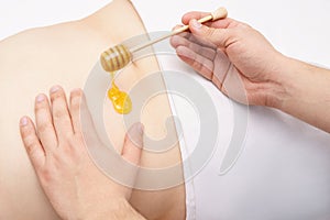 Anti-cellulite honey massage for healthy and smooth skin. Spa, w