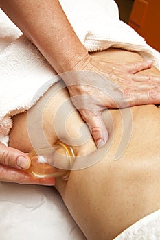 Anti cellulite massage with Ventuza vacuum body puller photo