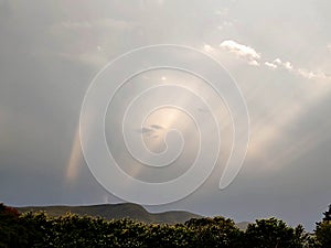 Anti crepuscular rays over the hills of Brazil.